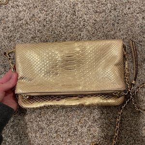 Gold Michael Kors purse
